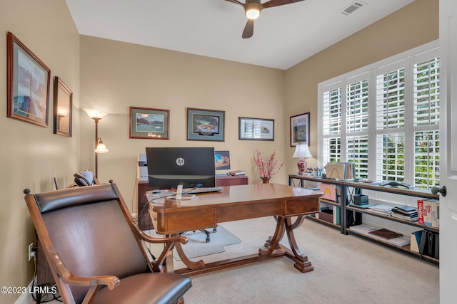 home office featuring carpet floors and ceiling fan