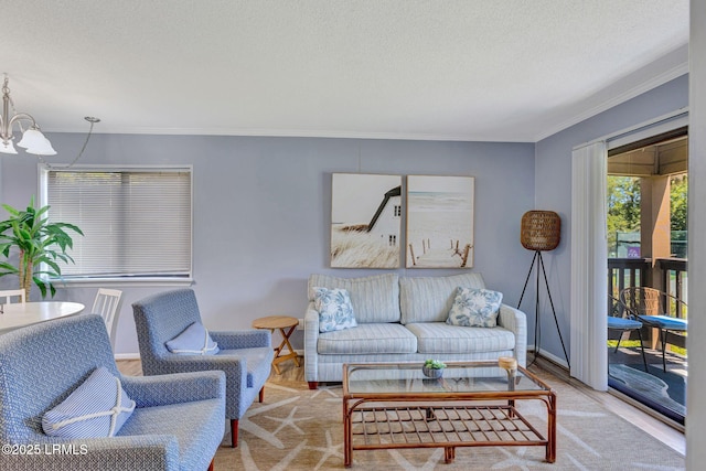 40 Folly Field Rd Unit G1, Hilton Head Island, SC 29928 - living room with a chandelier, ornamental molding, and a textured ceiling