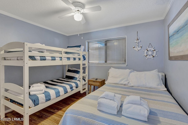 40 Folly Field Rd Unit G1, Hilton Head Island, SC 29928 - bedroom featuring wood finished floors, a ceiling fan, ornamental molding, and a textured ceiling