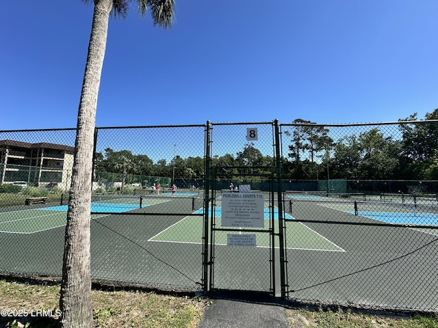 40 Folly Field Rd Unit G1, Hilton Head Island, SC 29928 - view of tennis court with a gate