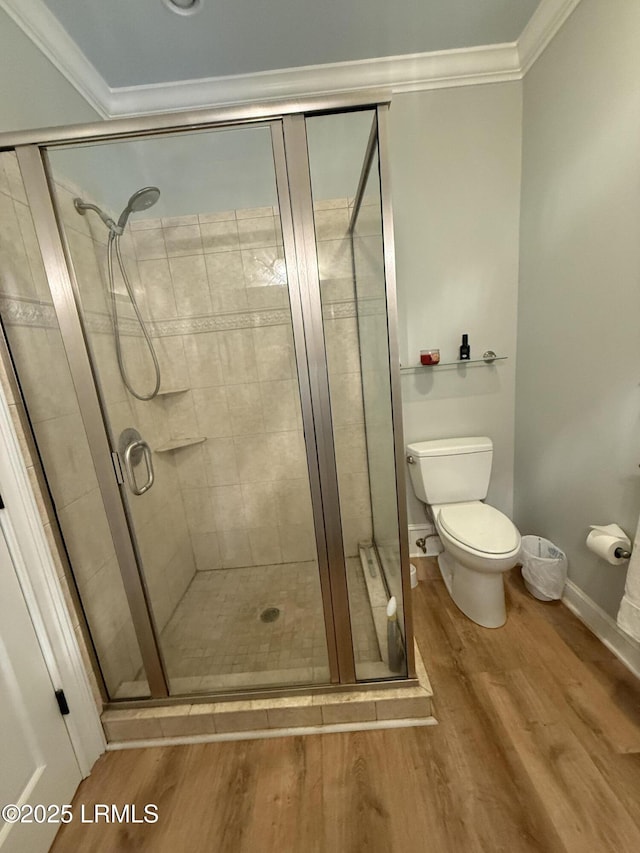 189 Deloss Point Rd, Ridgeland, SC 29936 - full bathroom featuring crown molding, wood finished floors, and a stall shower