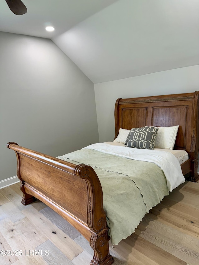 189 Deloss Point Rd, Ridgeland, SC 29936 - bedroom with light wood-style flooring, vaulted ceiling, and recessed lighting