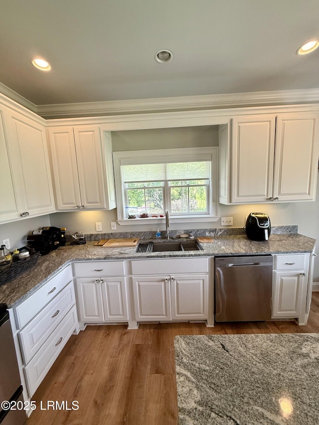 189 Deloss Point Rd, Ridgeland, SC 29936 - kitchen featuring dishwasher, white cabinetry, light stone counters, wood finished floors, and recessed lighting