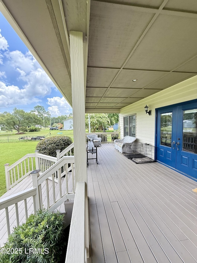 189 Deloss Point Rd, Ridgeland, SC 29936 - wooden porch featuring french doors and a lawn