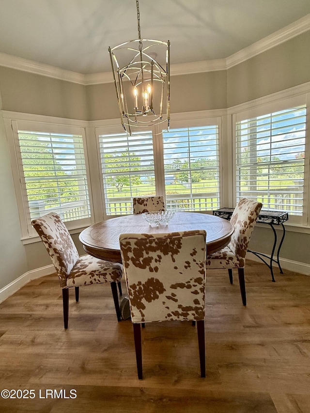 189 Deloss Point Rd, Ridgeland, SC 29936 - dining area featuring a chandelier, crown molding, and wood finished floors