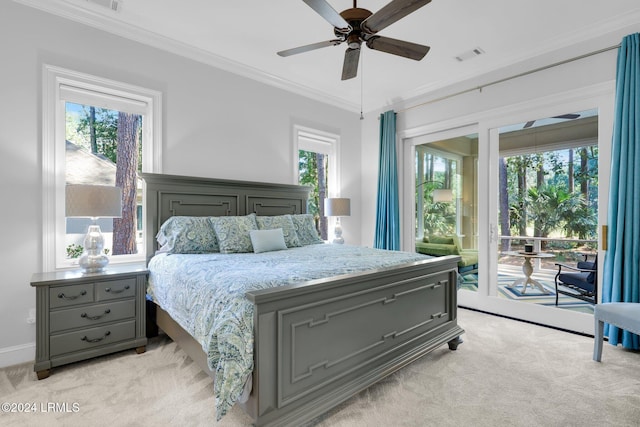 bedroom with ornamental molding, light colored carpet, access to exterior, and ceiling fan