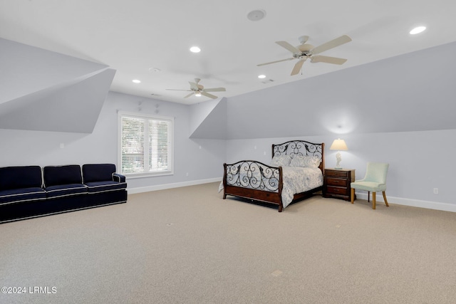 carpeted bedroom featuring lofted ceiling and ceiling fan