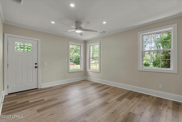 1730 Battery Park Dr, Port Royal, SC 29935 - entrance foyer featuring plenty of natural light, a ceiling fan, light wood-style flooring, recessed lighting, and crown molding