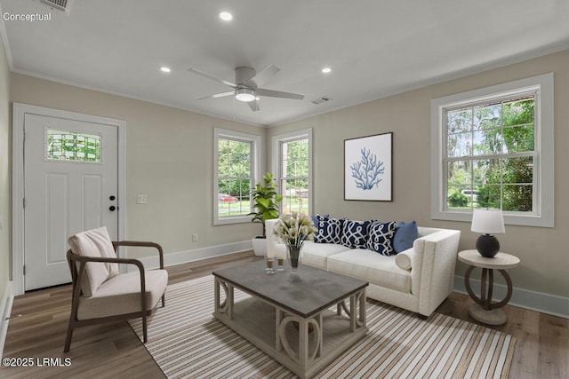 1730 Battery Park Dr, Port Royal, SC 29935 - living room with healthy amount of natural light, crown molding, wood finished floors, recessed lighting, and ceiling fan