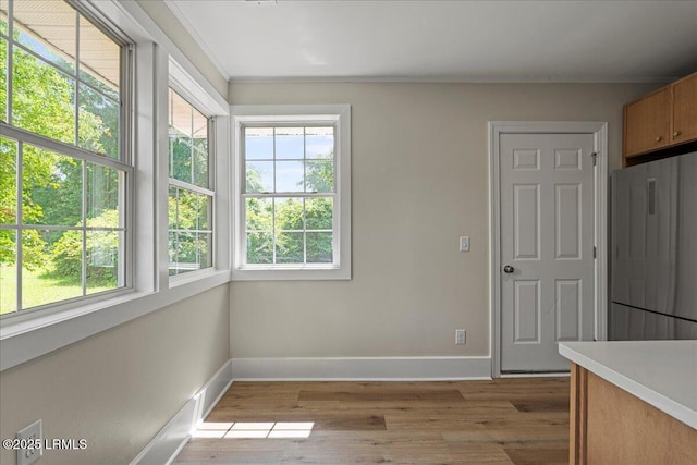 1730 Battery Park Dr, Port Royal, SC 29935 - unfurnished dining area with baseboards and light wood finished floors