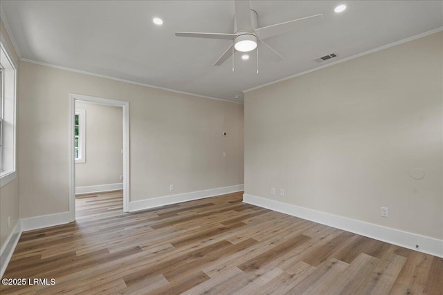 1730 Battery Park Dr, Port Royal, SC 29935 - spare room with ornamental molding, ceiling fan, light wood-type flooring, and recessed lighting