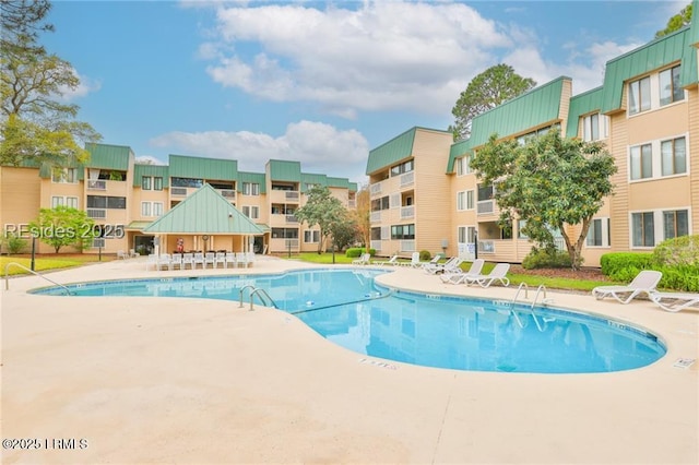 community pool featuring a patio