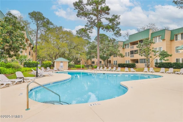 pool with a patio