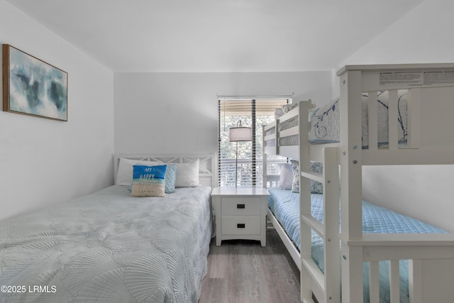 bedroom featuring wood finished floors