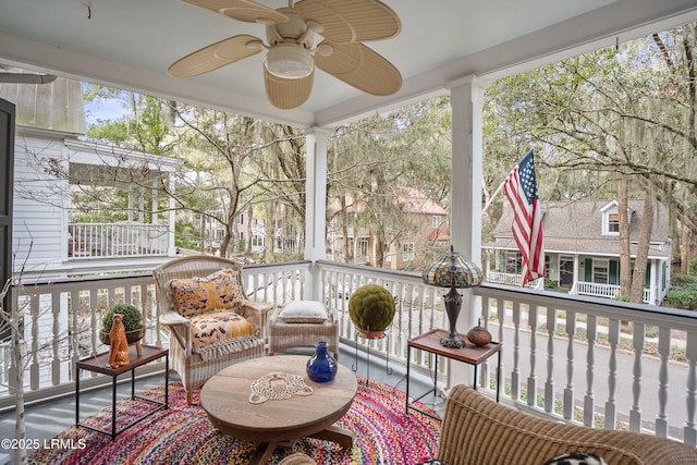 sunroom / solarium with ceiling fan