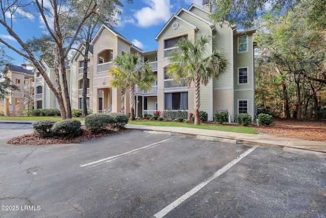 380 Marshland Rd Unit H34, Hilton Head Island, SC 29926 - view of building exterior featuring uncovered parking