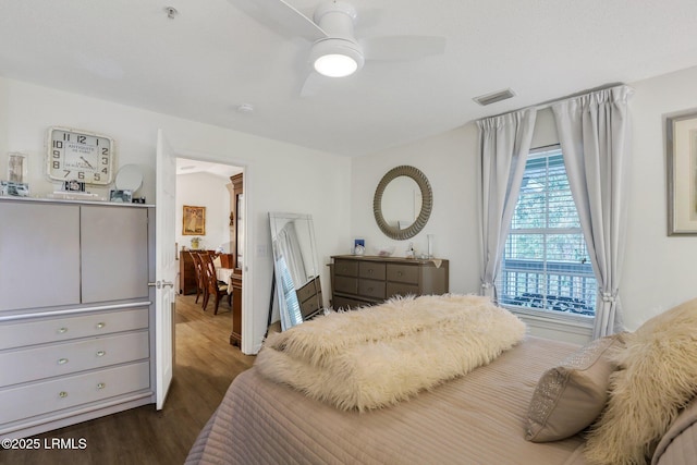380 Marshland Rd Unit H34, Hilton Head Island, SC 29926 - bedroom featuring visible vents, dark wood-style floors, and ceiling fan