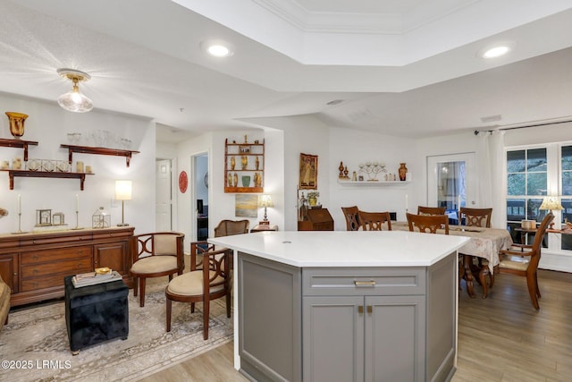 380 Marshland Rd Unit H34, Hilton Head Island, SC 29926 - kitchen with recessed lighting, light countertops, a kitchen island, gray cabinetry, and light wood-style flooring
