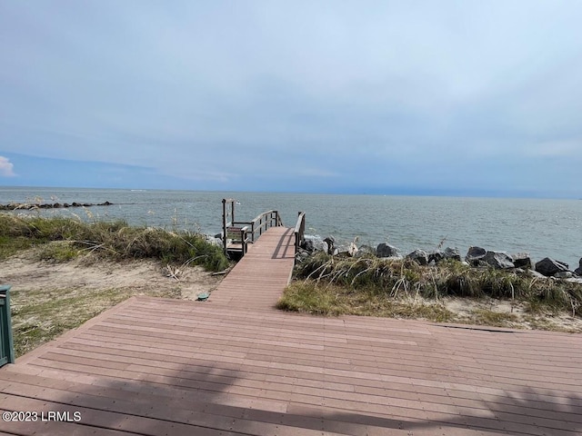 view of dock with a water view