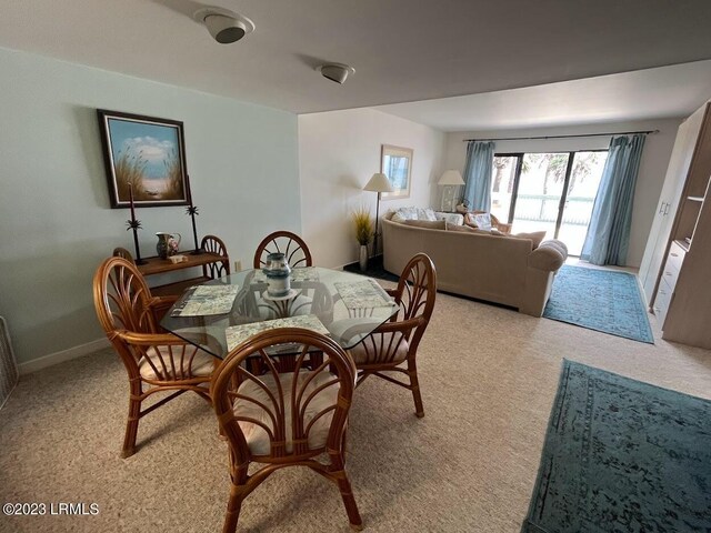 view of carpeted dining room