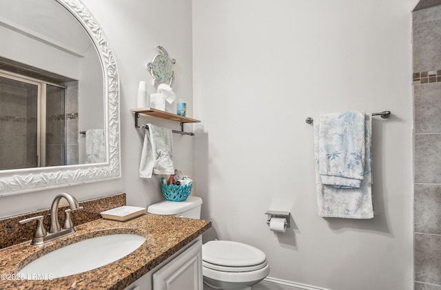 104 Grande Oaks, Beaufort, SC 29906 - bathroom featuring a shower with door, vanity, and toilet
