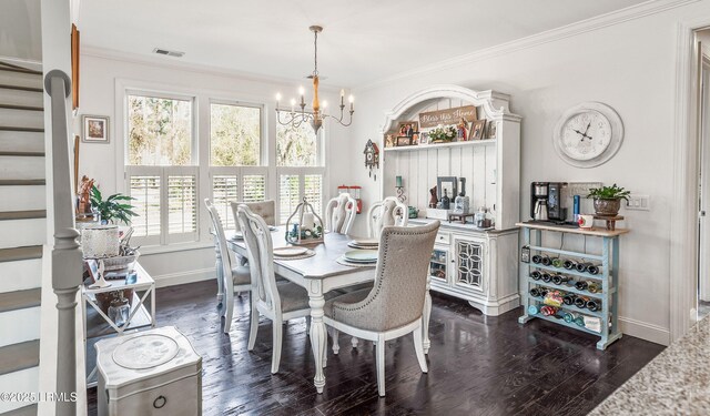 104 Grande Oaks, Beaufort, SC 29906 - dining space featuring ornamental molding, dark hardwood / wood-style flooring, and a chandelier