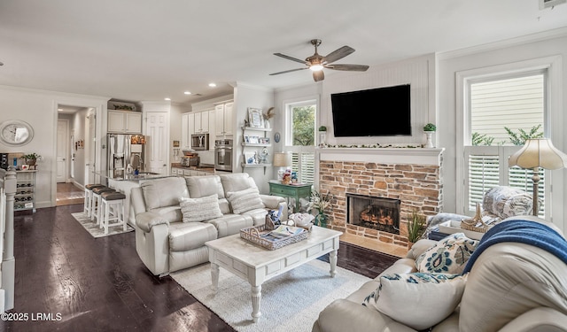 104 Grande Oaks, Beaufort, SC 29906 - living room featuring a fireplace, ornamental molding, dark hardwood / wood-style flooring, and sink