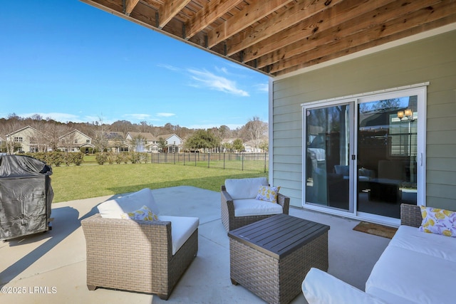 view of patio / terrace featuring an outdoor hangout area, fence, and a grill