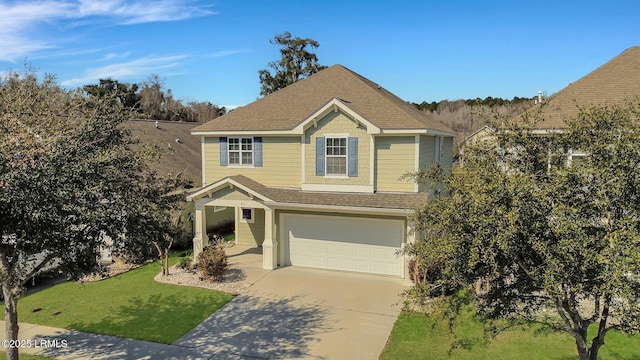 traditional-style home with a garage, a shingled roof, a front lawn, and concrete driveway