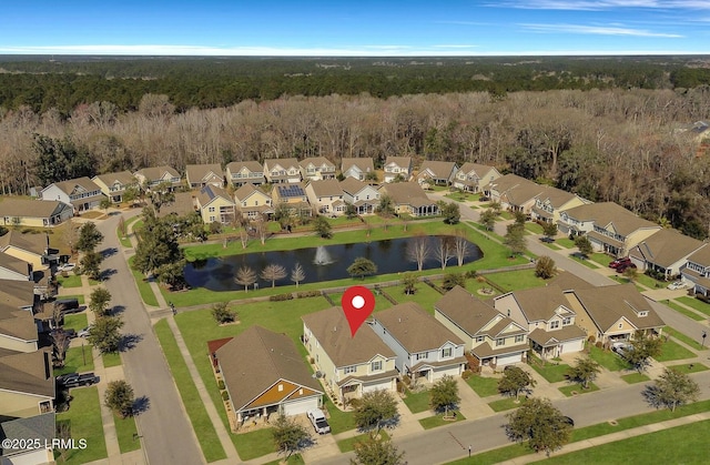 aerial view with a water view and a residential view