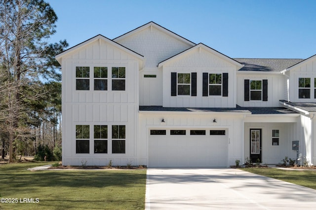 modern inspired farmhouse featuring board and batten siding, concrete driveway, and a front lawn