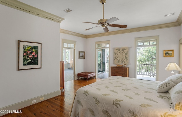 bedroom with access to exterior, visible vents, crown molding, and wood finished floors