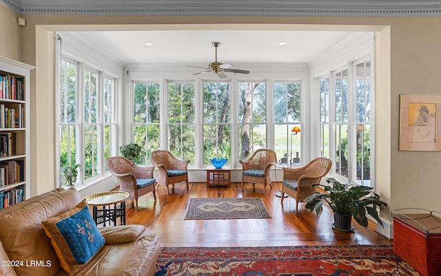 sunroom with ceiling fan