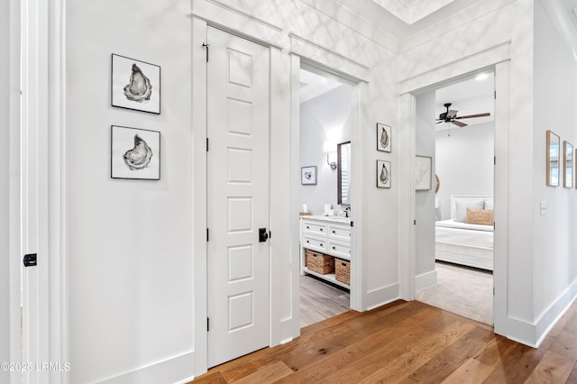 hallway featuring light hardwood / wood-style floors