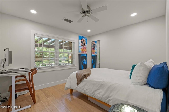 602 Huguenin Dr, Beaufort, SC 29902 - bedroom with light wood-type flooring, recessed lighting, and a ceiling fan