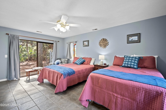 bedroom with tile patterned floors, a textured ceiling, access to exterior, visible vents, and a ceiling fan