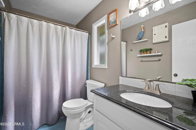 full bathroom featuring vanity and toilet