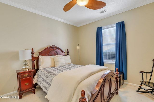 bedroom featuring crown molding, a textured ceiling, and ceiling fan