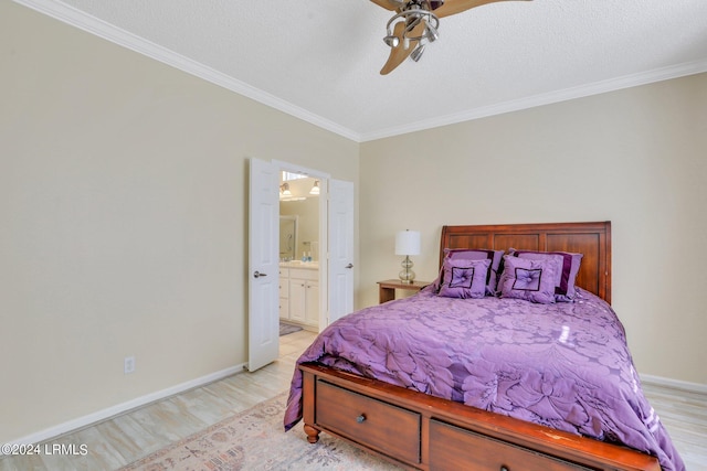 bedroom featuring ensuite bath, ornamental molding, ceiling fan, a textured ceiling, and light wood-type flooring