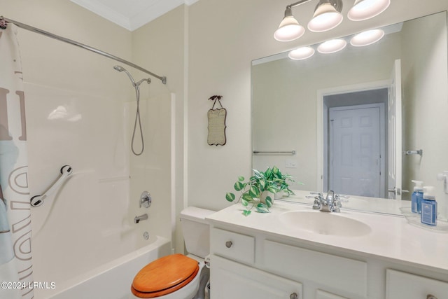 full bathroom with  shower combination, vanity, crown molding, and toilet