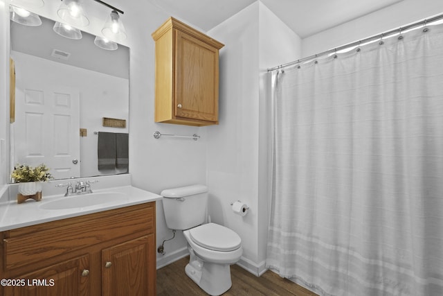 249 Hitching Post Cres, Bluffton, SC 29910 - bathroom featuring vanity, wood finished floors, toilet, and a shower with shower curtain