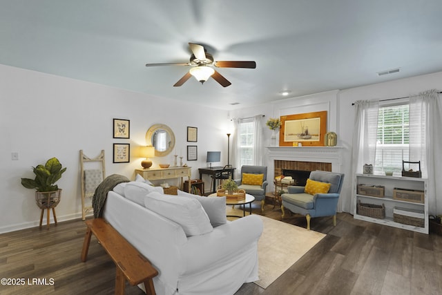 249 Hitching Post Cres, Bluffton, SC 29910 - living area featuring a ceiling fan, dark wood finished floors, and a fireplace