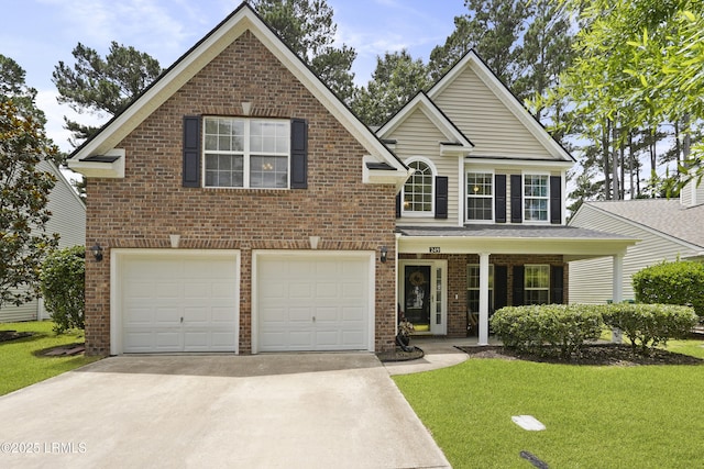 249 Hitching Post Cres, Bluffton, SC 29910 - traditional-style house with concrete driveway, a garage, a front yard, and brick siding
