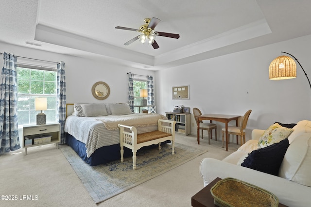 249 Hitching Post Cres, Bluffton, SC 29910 - bedroom featuring a raised ceiling, carpet flooring, multiple windows, and crown molding