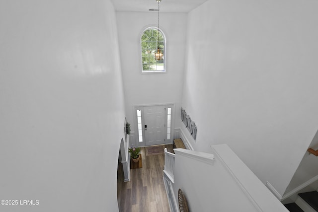249 Hitching Post Cres, Bluffton, SC 29910 - stairs featuring wood finished floors and a chandelier