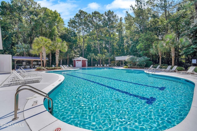 249 Hitching Post Cres, Bluffton, SC 29910 - community pool featuring a patio area and view of scattered trees