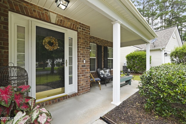 249 Hitching Post Cres, Bluffton, SC 29910 - entrance to property featuring covered porch and brick siding