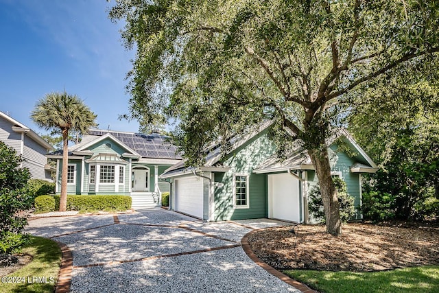 view of front of home featuring solar panels