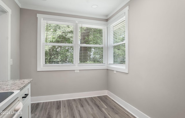 interior space with plenty of natural light and light hardwood / wood-style floors