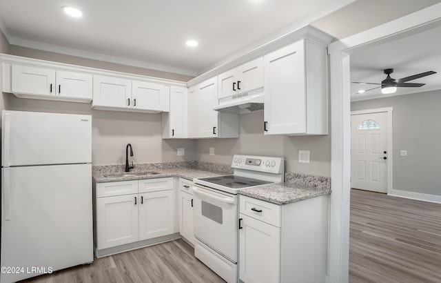 kitchen with white cabinetry, sink, and white appliances